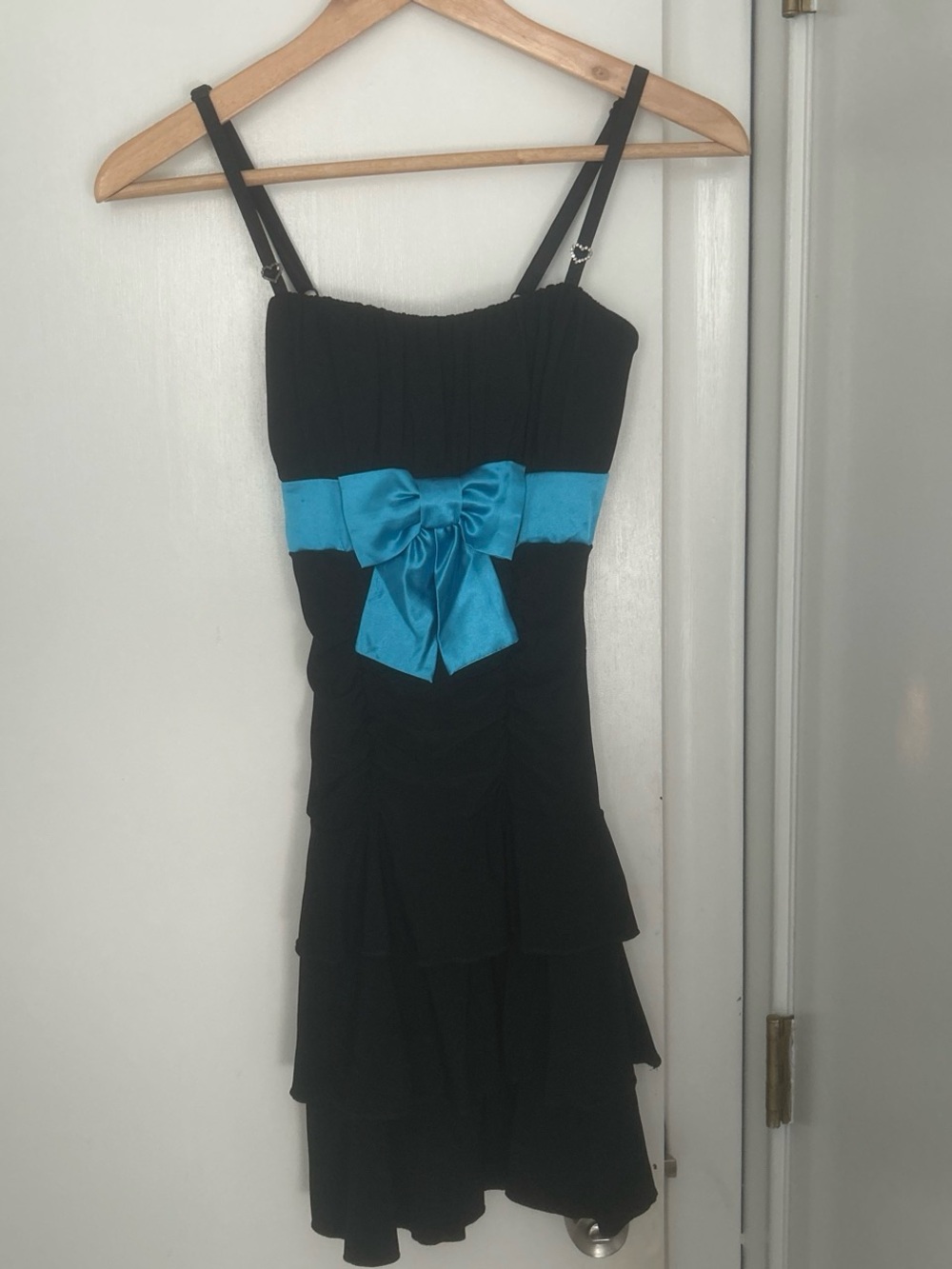Vintage black tiered mini dress with turquoise satin bow